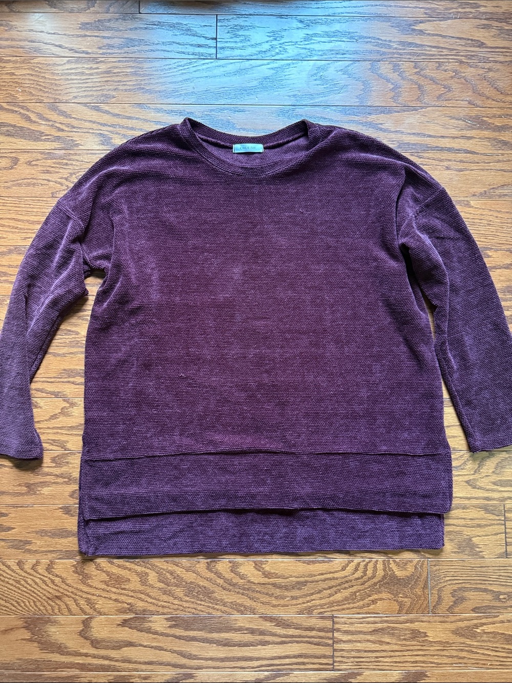 Cherish Scoop Neck Layered Hem Sweater in Plum